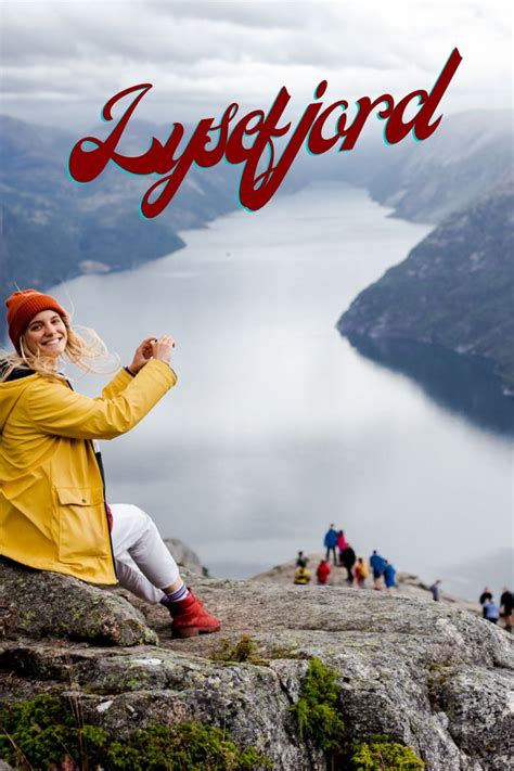 Hiker taking a photo of the Lysefjord in Norway. Travel Advice, Travel ...