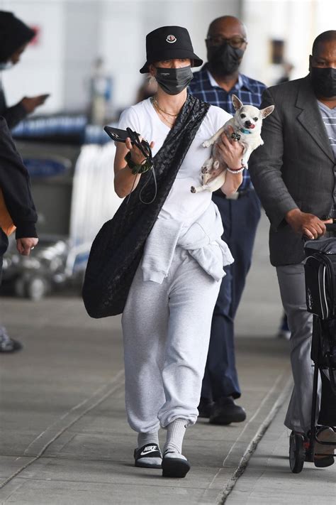 Kaley Cuoco - Arrives with her dog at JFK Airport in New York-13 | GotCeleb