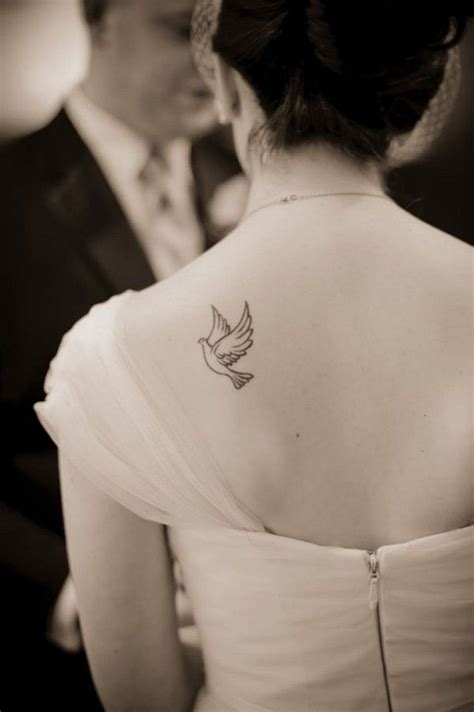 46 Impressive and Peaceful Dove Tattoo Designs | Girl shoulder tattoos, Dove tattoo design, Dove ...