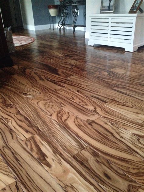 Pin by Tricia Adams on House Ideas | Wood floor design, Tigerwood flooring, Floor design