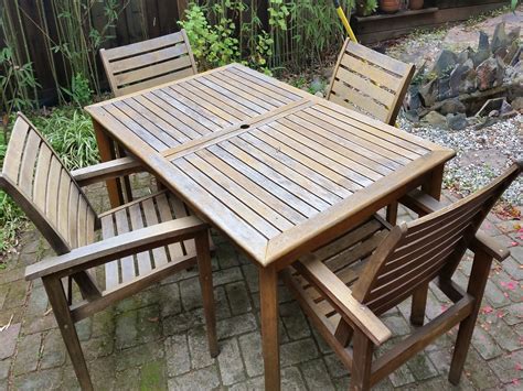 Teak patio furniture before restoration - Cal Preserving