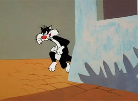 Sylvester sneaking behind a building | Animated cartoon characters, Looney tunes cartoons ...