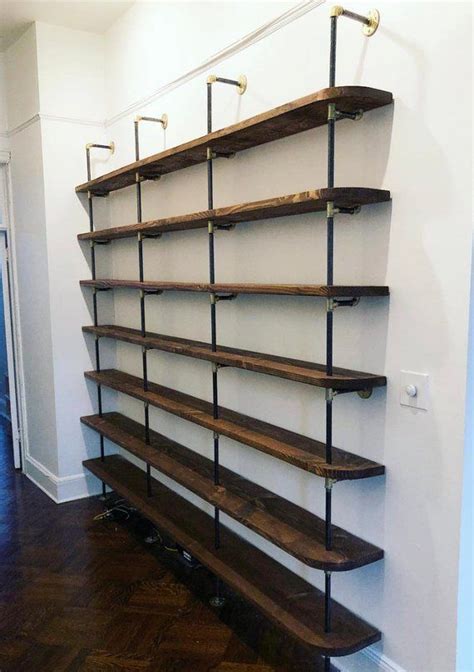 Black Pipe Shelving with Brass Accents | Etsy Black Pipe Shelving, Industrial Pipe Shelves ...