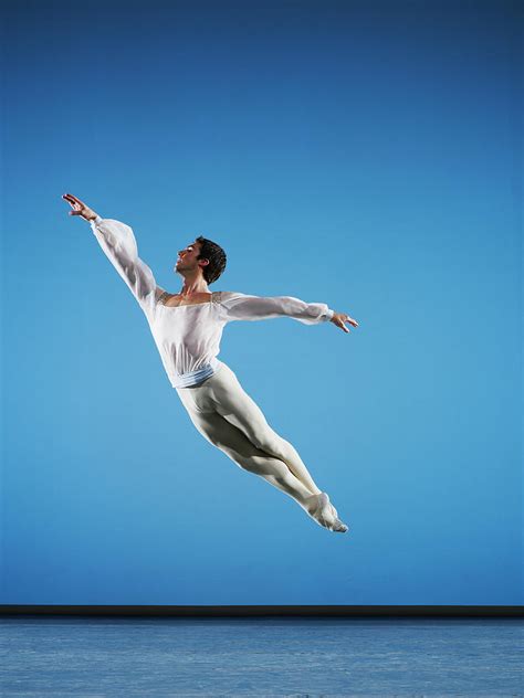 Male Ballet Dancer Leaping On Stage Photograph by Thomas Barwick - Pixels