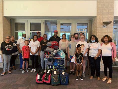 Ikandy hosts backpack giveaway - The Garland Texan Local News