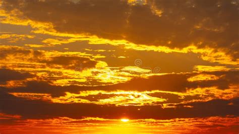 Golden Sunset on the Sky with Clouds Stock Image - Image of orange ...