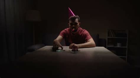 Sad lonely man in party hat celebrating birthday alone, depression ...