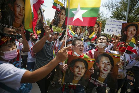 Myanmar crisis heightens with police raids and strike call | AP News