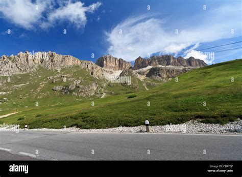 road in Pordoi pass beneath Sella Mountain Stock Photo - Alamy