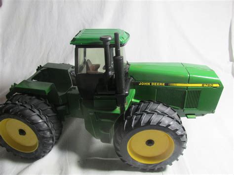 vintage john deere metal toy tractors - Christian Roark