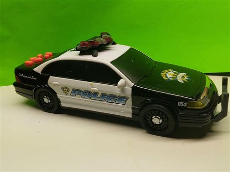 fun way Toy State Motorized Police Vehicle car Lights Sirens load and ...