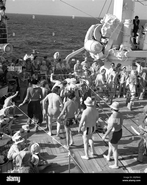 circa late 1960s, historical, passengers on the deck of a cruise ship ...