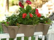 Setting up self watering plant containers to ensure your plants always have enough water.