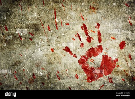 Bloody hand print and blood splatter on a grungy wall Stock Photo - Alamy