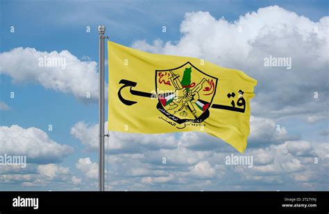 Fatah formerly the Palestinian National Liberation Movement flag waving in the wind Stock Photo ...