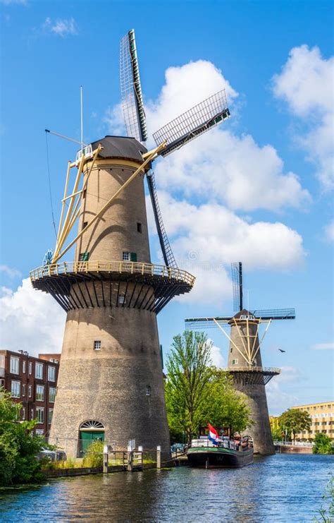 Windmills in Schiedam, Netherlands Editorial Photo - Image of port, tree: 301939661