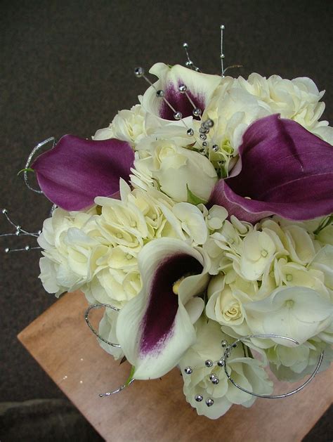 File:White and purple bridesmaid bouquet.jpg - Wikimedia Commons