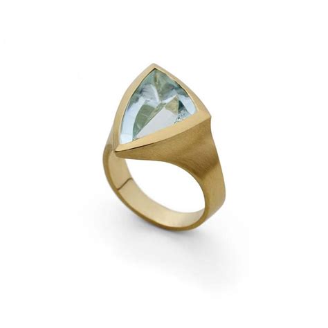 Mccaul Goldsmiths return to the Goldsmiths Fair with hand carved contemporary rings set with ...