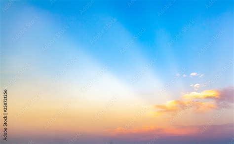 beautiful blue sunset sky with white clouds background, Nature background, yellow and orange ...