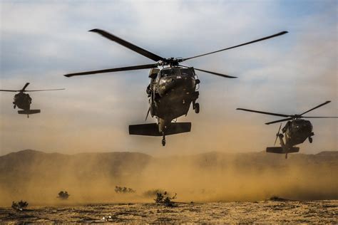 Air Assault! Three UH-60 Blackhawk helicopters, carrying the U.S. Army ...