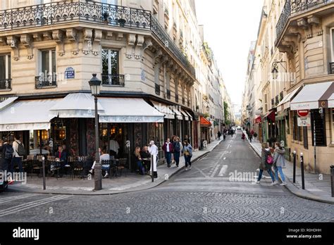 Typical Cafe and street in Paris Stock Photo - Alamy