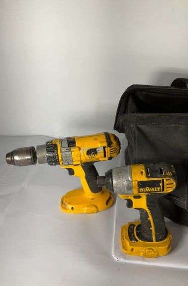 Skil tool bag filled with Dewalt tools, batteries, and charger. - Hash Auctions