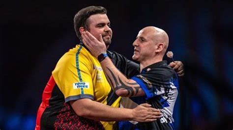 World Darts Championship: Michael Smith shows class to knock out Joe ...