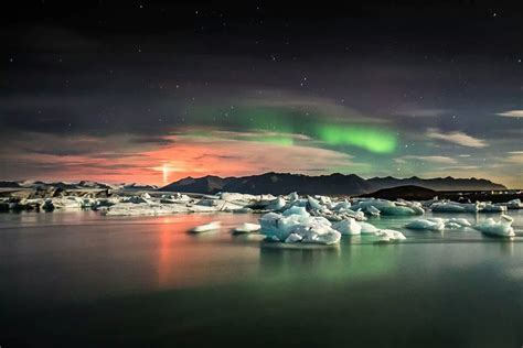 northern lights and eruption of bardarbunga volcano, iceland photo ...