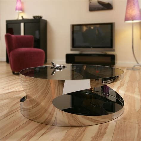glass reflective coffee table | Round coffee table modern, Round glass coffee table, Round ...