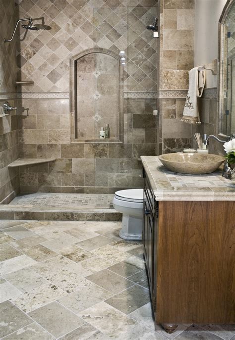 This driftwood travertine was installed in 2008 and still looks stunning! #tile #thetileshop ...
