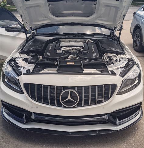 Missed the sound of of engine so swapped the Model 3 for a C63S. Loving ...