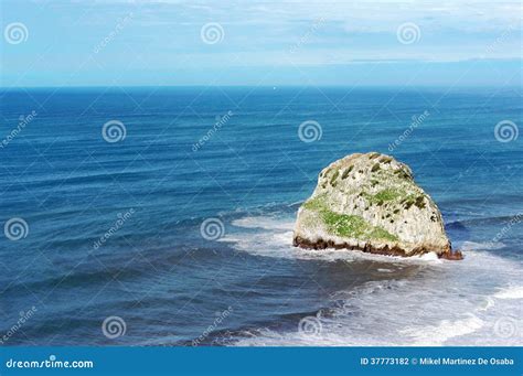 Small Rocky Island Named Aketxe In Bermeo Stock Photography | CartoonDealer.com #37773182