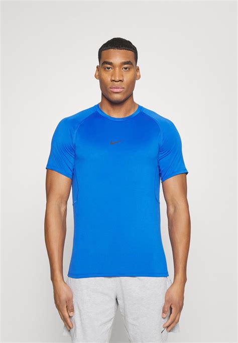 Nike Performance SLIM TOP - Sports T-shirt - game royal/(black)/blue ...