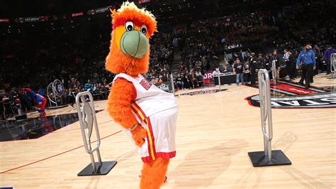 Watch: Heat mascot botches jump, lands on other mascots, celebrates