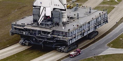 NASA's 6 million pound crawler-transporter carries rockets - Business Insider