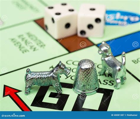 Monopoly Game and Board Pieces Editorial Photography - Image of thimble, activity: 40081387