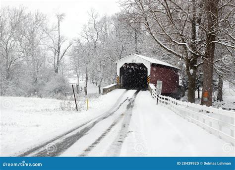 Covered Bridge in Snow stock photo. Image of field, landmark - 28439920