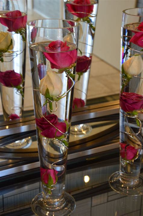 Flower displays in water | Wedding centerpieces diy, Cheap wedding ...