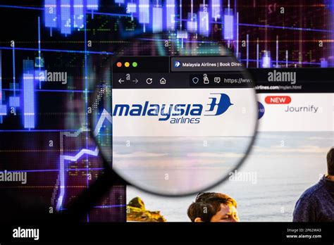 Malaysia Airlines company logo on a website with blurry stock market ...