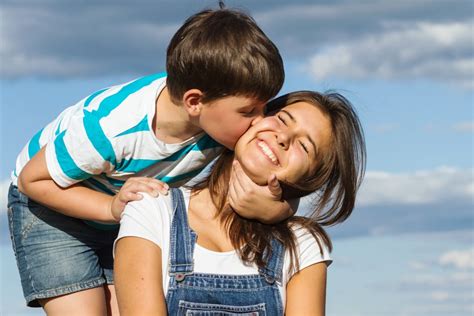 Kid kisses are so affectionate and drooly. | Kids Are the Best Thing Ever | POPSUGAR Moms Photo 13