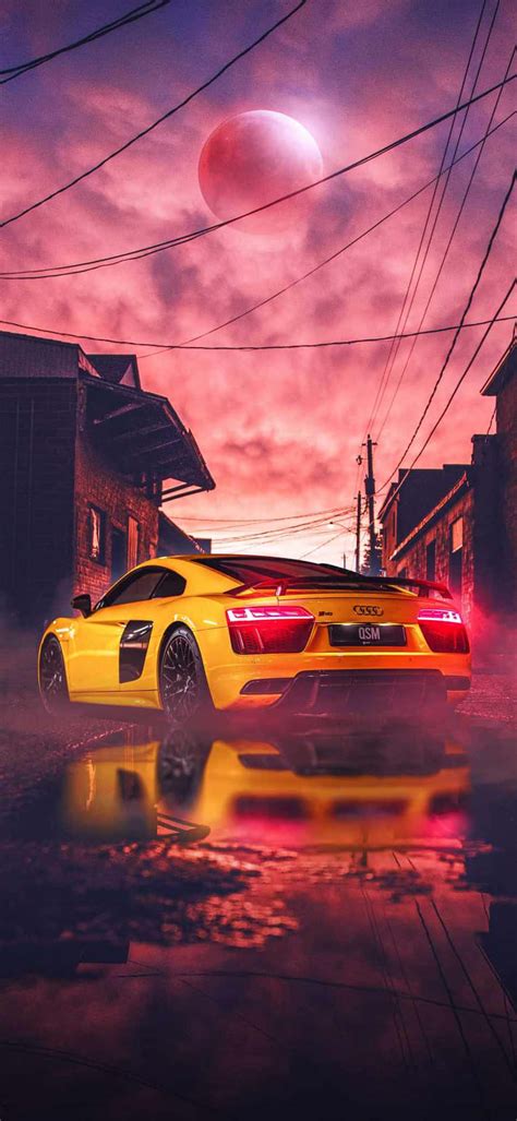 Download Yellow Audi Car Alien Sky Background Iphone Wallpaper | Wallpapers.com