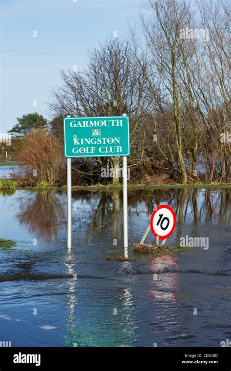 Garmouth & Kingston Golf Club sign flooded by River Spey at Garmouth, Scotland in April 2010 due ...