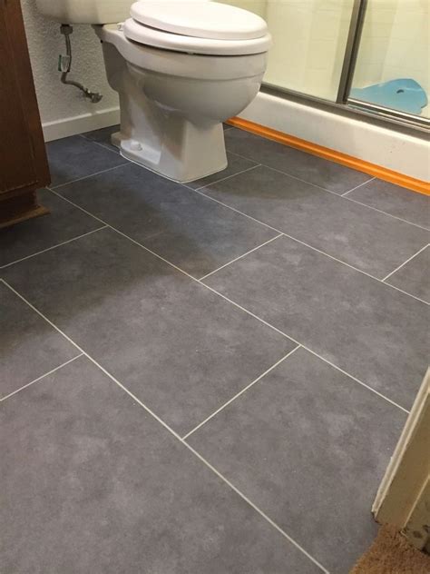 I recently put in stone/slate look luxury vinyl tiles in my bathroom? | Vinyl plank flooring ...