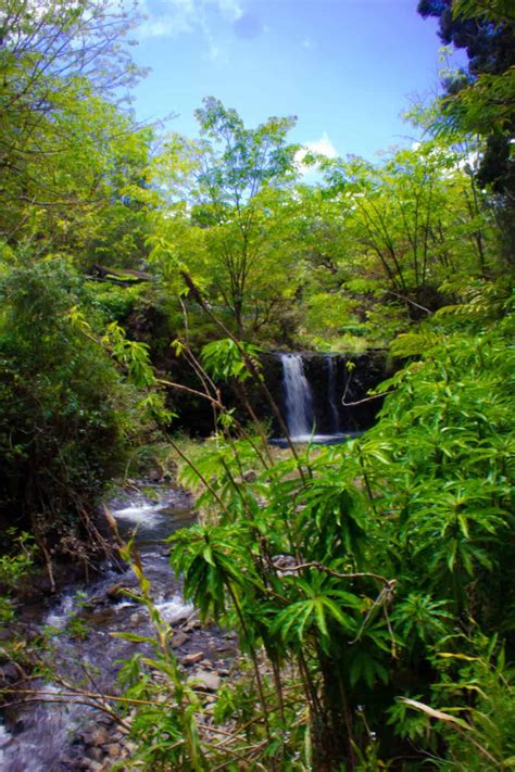 Hana Highway Hawaii, swimming beneath Maui's waterfalls