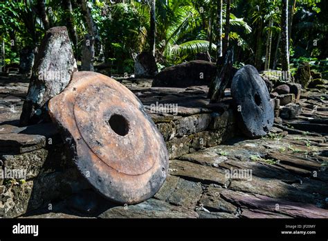 Stone money on the island of Yap, Micronesia Stock Photo - Alamy