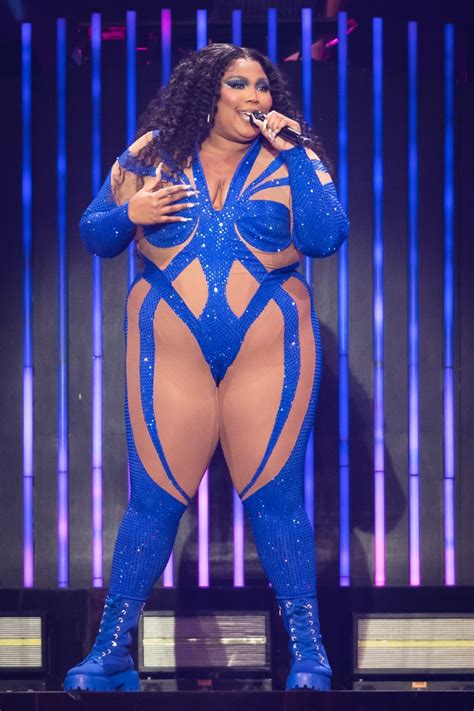 Lizzo Wears Neon Bedazzled Catsuit on Special Tour | POPSUGAR Fashion