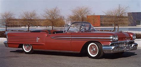 1958-59 Olds factory photo-convertibles