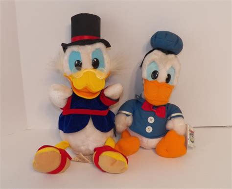 Sold Price: Walt Disney's Donald Duck & Scrooge McDuck Plush Dolls ...