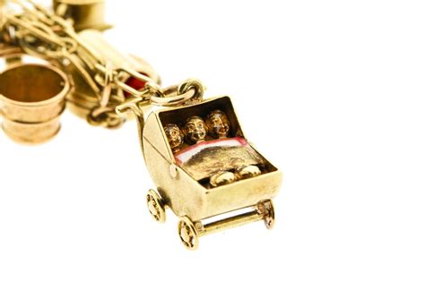 Retro 14 Karat Yellow Gold Charm Bracelet with Moving Charms at 1stDibs | 14 karat gold charm ...