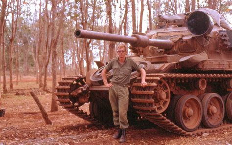 Australian soldier Gordon Taylor standing in front of Centurion Mk 5/1 ...